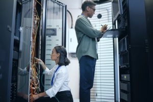 people working in a server room