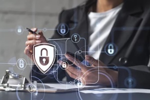 businesswoman in formal wear signing the contract to prevent probability of risks in cyber security