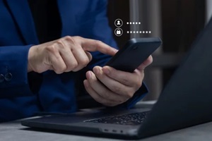 close up businessman use smartphone and type username and password to access private account of office for security system of business technology concept 