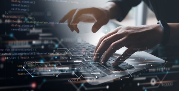Programmer On Laptop