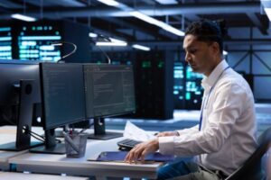 Cybersecurity Specialist Performing Data Encryption Services For A Client