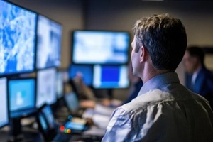 high-tech operations center with logistics professionals using advanced tools to optimize supply chain management
