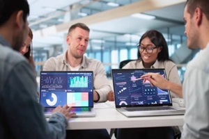 multicultural data analyst leading virtual meeting