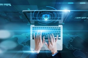 Man using laptop with security shield icon representing IT services