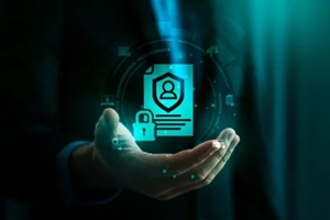 data protection and cybersecurity concept with businessman holding hologram icon of secure personal information