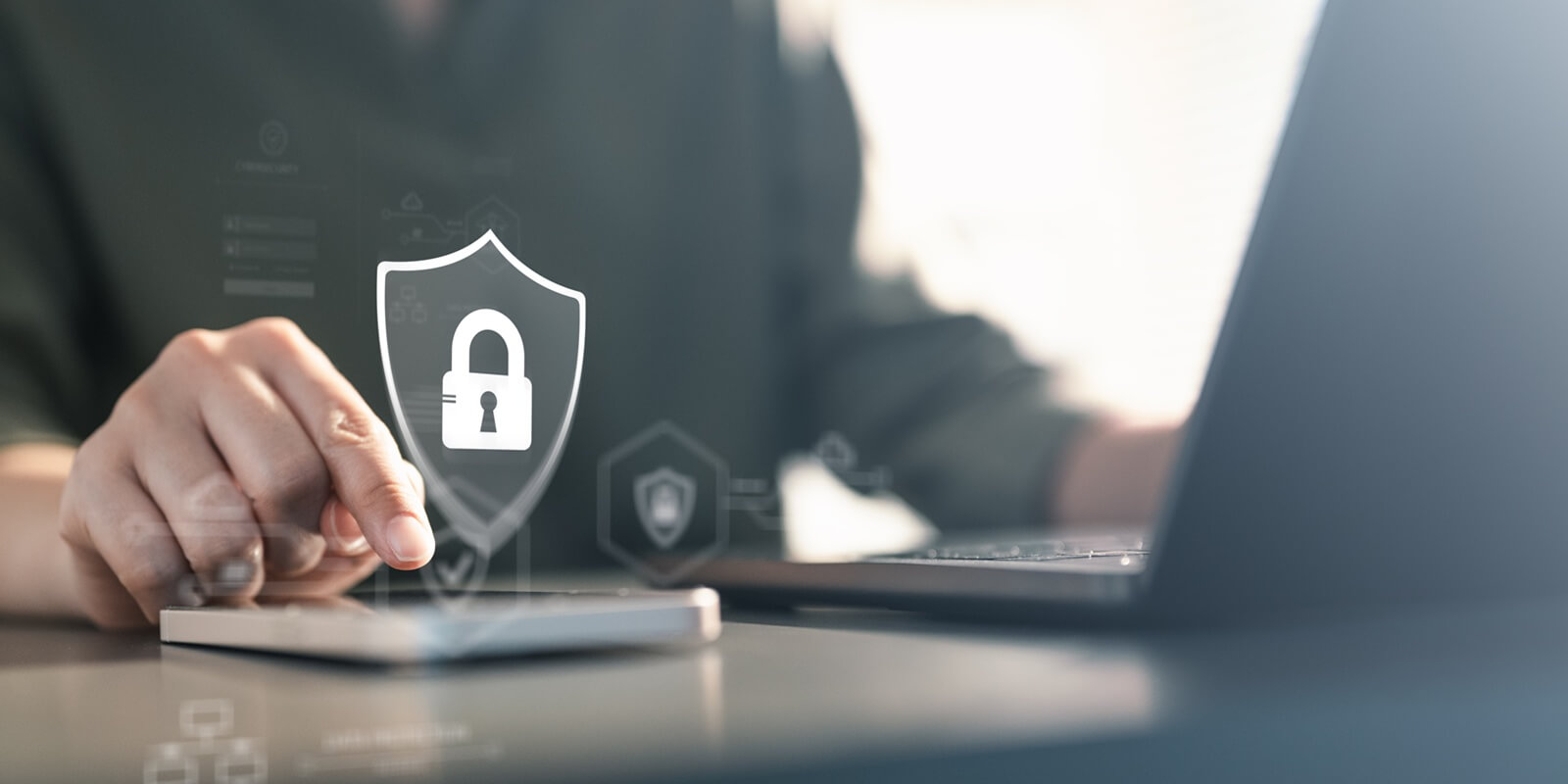 person using a mobile device with a digital lock shield icon, representing cybersecurity, data protection, encryption, and secure access