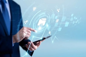 IT specialist using the tablet and analyzing data backup performance data