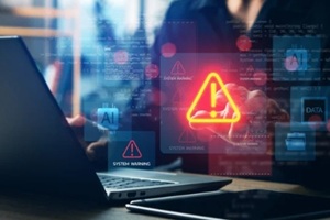 cybersecurity system warning alert on laptop with AI and data icons