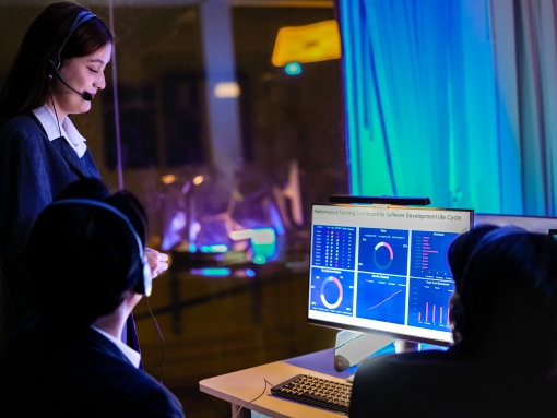 AI managed IT service desk team monitoring performance dashboards and providing real-time support for Frederick, MD businesses