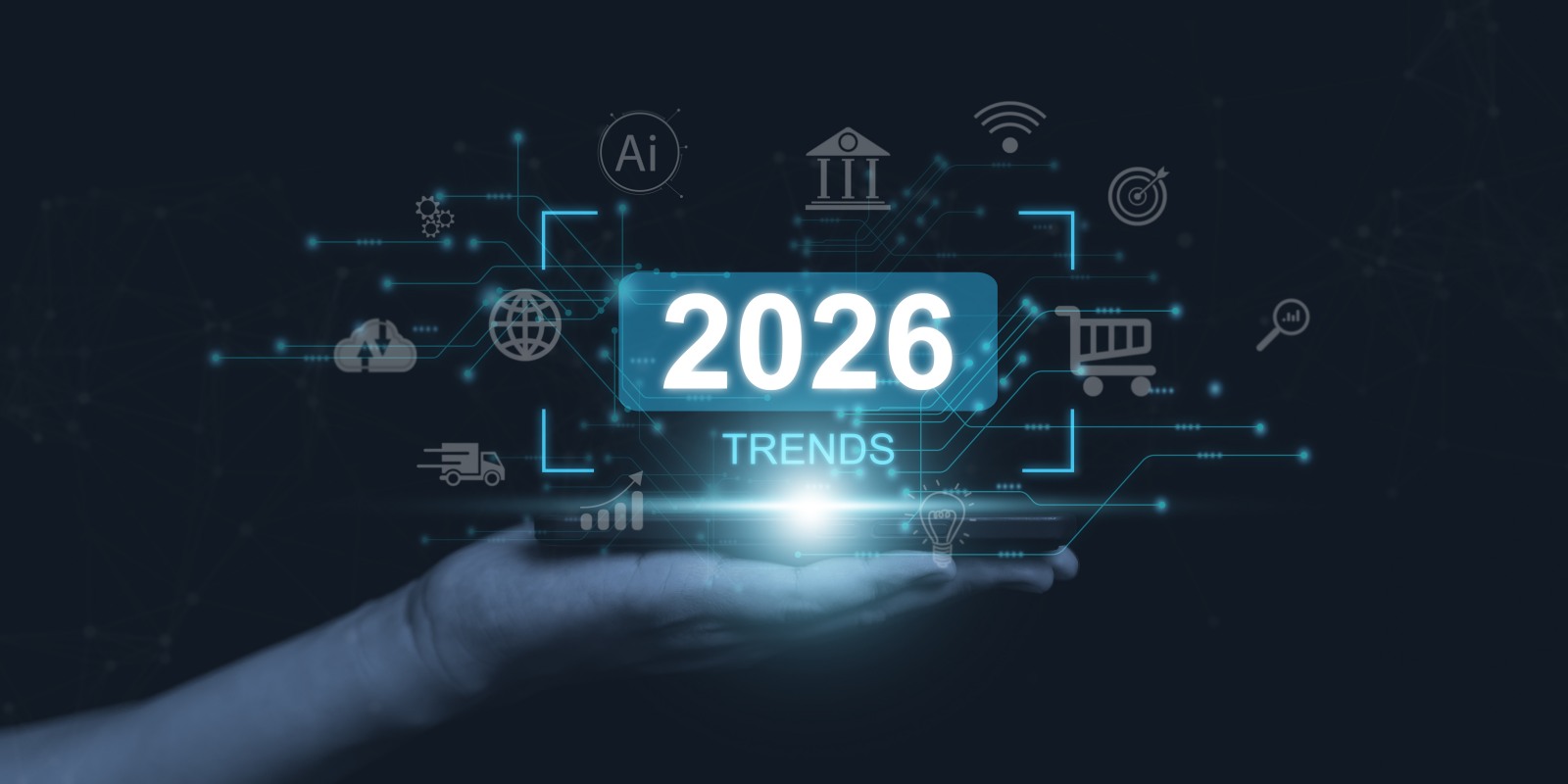 Hand holding a glowing digital display of 2026 trends