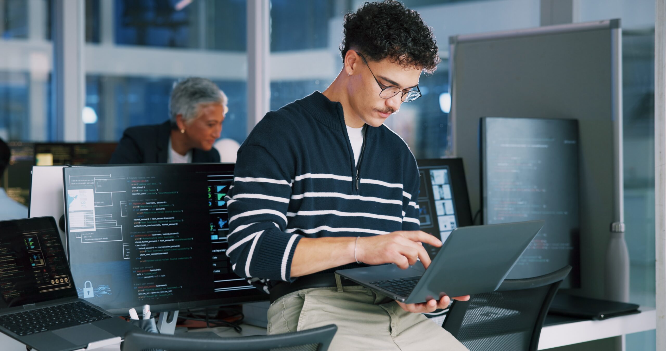 IT professional analyzing cybersecurity code