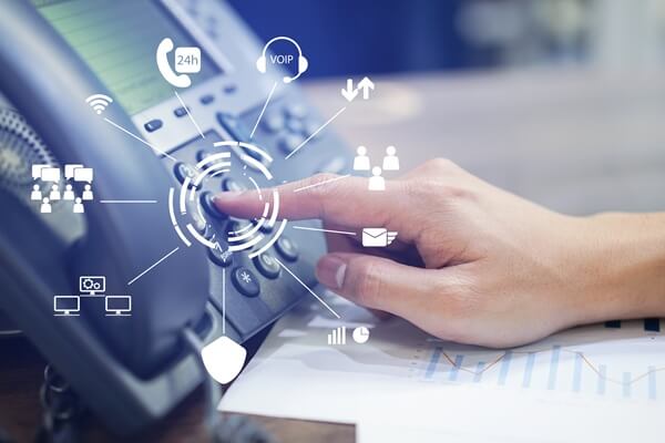 close up employee man hand press number on telephone for contact with virtual one stop business communication interface