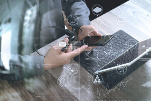 top view of man hand using VOIP headset with digital tablet comp