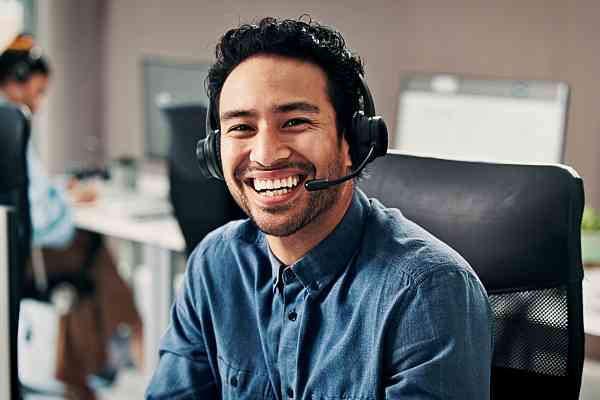 support team member smiling